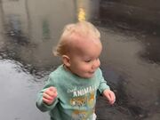 Baby Boy And His Ability To Jump In The Rain