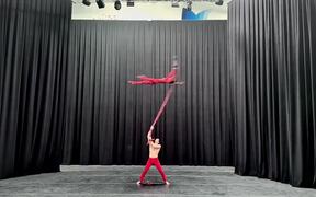 Woman Hangs Onto Aerial Strap - Fun - VIDEOTIME.COM