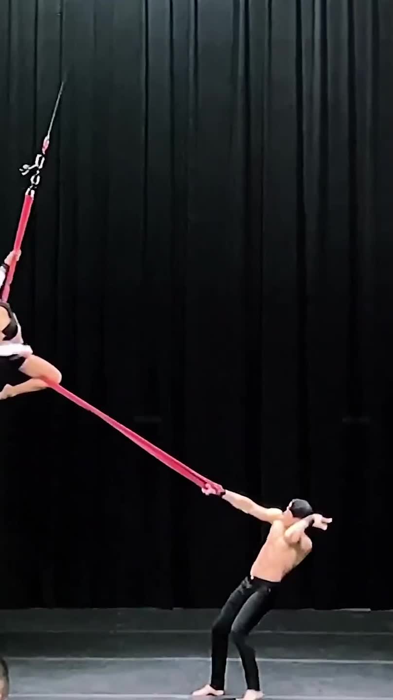Couple Shows Awesome Tricks on Aerial Straps