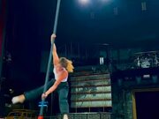 Girl Performs Mid-air Spinning Trick on Pole