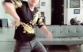Guy Performs Tricks With Nunchucks