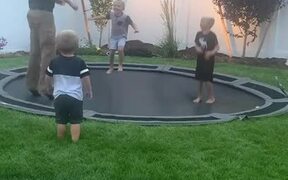 Kid Falls Off Trampoline When Dad Attempts Jump