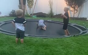 Kid Falls Off Trampoline When Dad Attempts Jump