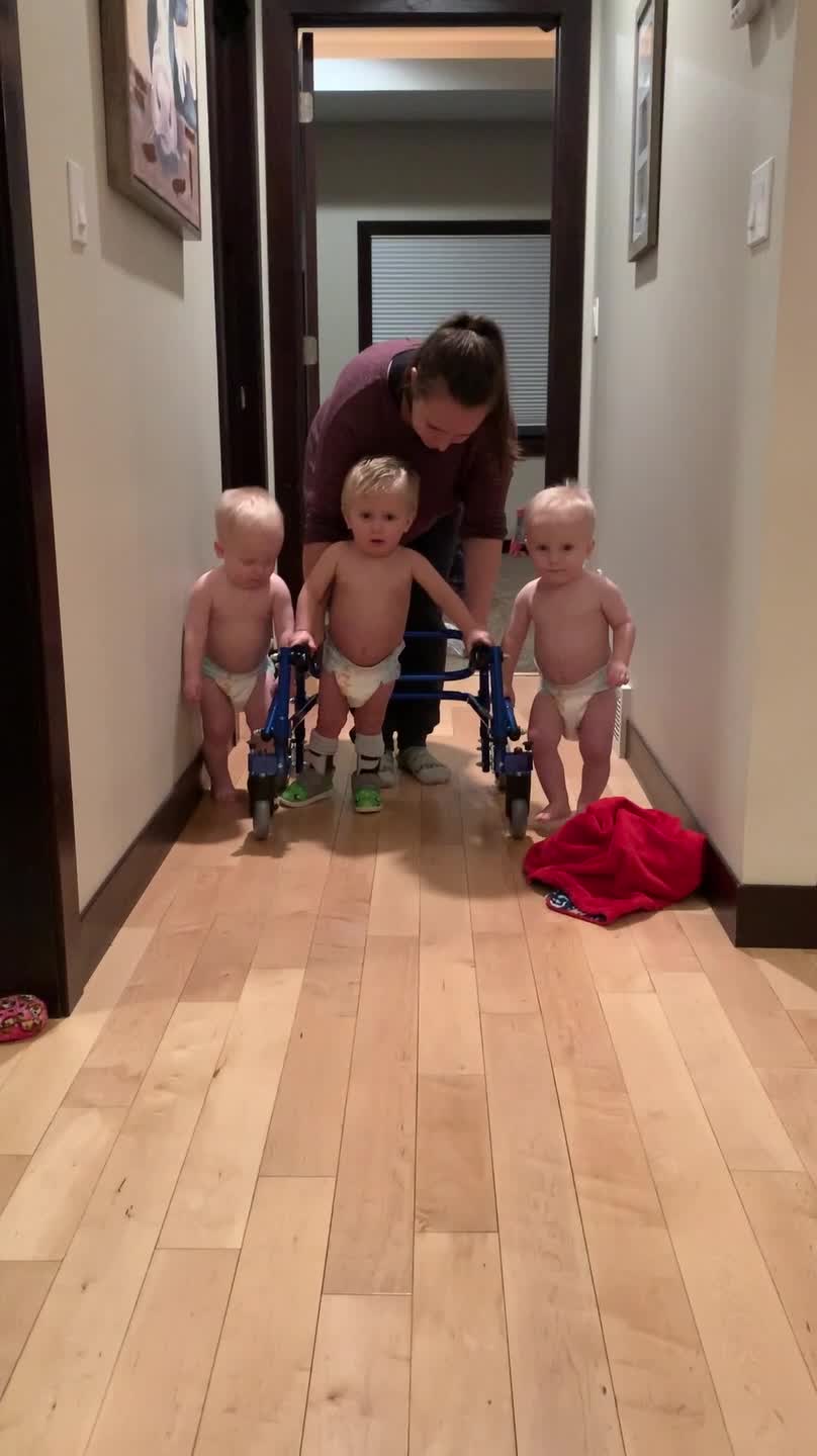 Boys Stick by Their Triplet Brother's Side