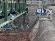 Parkour Enthusiast's Ankle-Cracking Bridge Jump