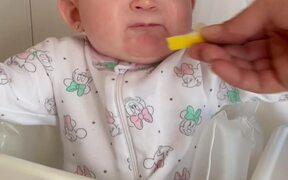 Baby Has an Adorable Reaction on Tasting Lemon - Kids - VIDEOTIME.COM
