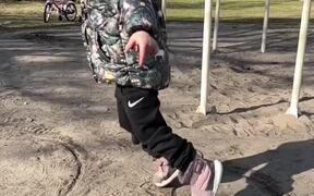 Little Girl Exercises with Dad