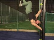 Man Performs Handstand on Pullup Bar