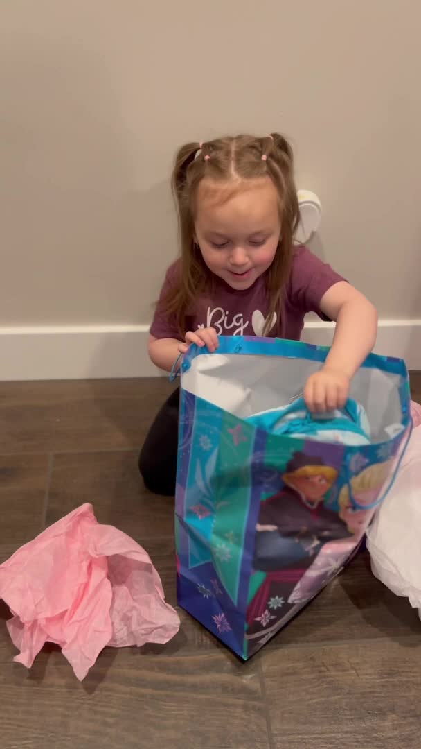 Girl Utters Loud Expletive After Opening A Gift