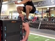 Athlete Jumps on Top of Another Person's Shoulders