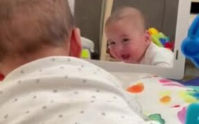 Baby Boy Laughs On Seeing Himself in Mirror