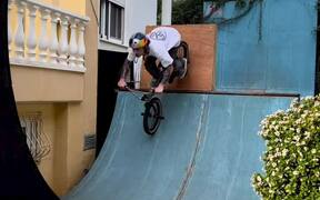 BMX Rider Performs Triple Open Loop