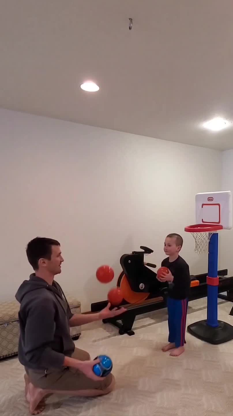 Family Juggles Balls Together