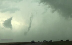Person Witnesses Tornado Formation During Storm
