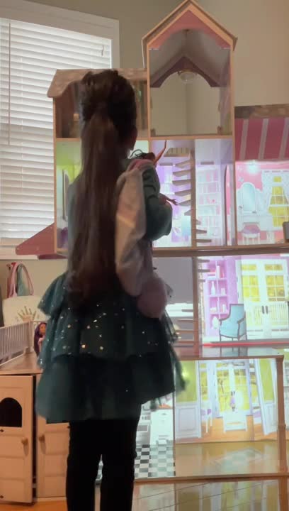 Little Girl Loves Her New Digital Dollhouse