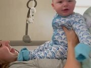 Baby Pukes on Mom's Face as She Goes to Kiss Him