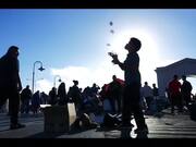 Kid Performs Magic and Juggling Tricks on Street