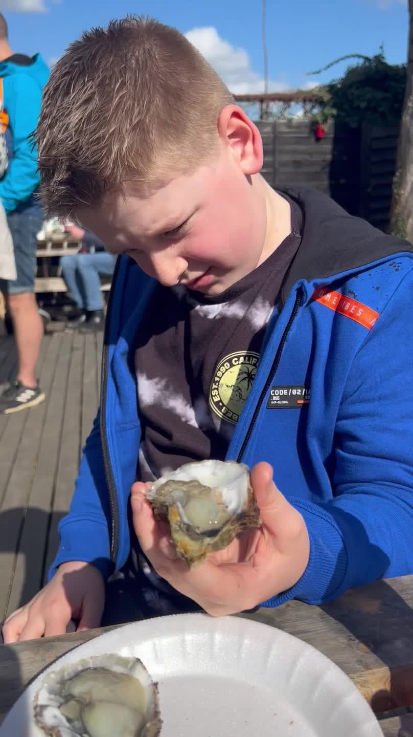 Boy Sends Oyster Flying Out Of His Mouth
