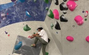 Man Falls Hard During Gym Wall Climbing