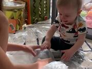 Sweet Toddler Giggles Uncontrollably