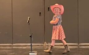 Kid Drops Mic Stand Twice While Performing 