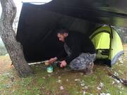 Guy Goes Camping With Dog in Snowy Winter Weather