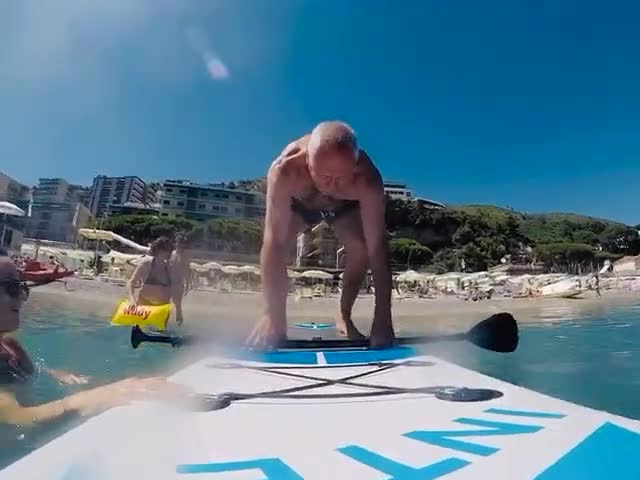 Dad Falls Into Water After Loosing Balance