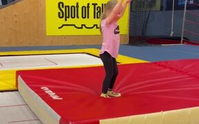 Little Girl Does Gymnastic Training With Dad