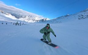 Man Does Snowboarding Tricks at Resort