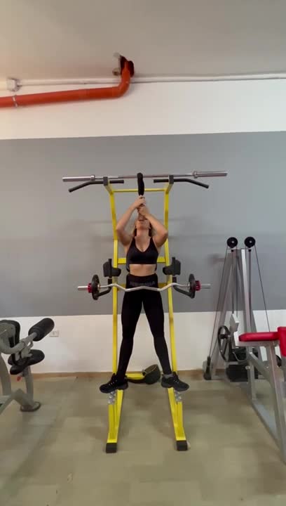Woman Does Barbell Curls