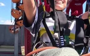 Woman Enjoys Bungee Swing Ride