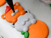 Person Prepares Cute Animal Shaped Macarons