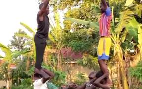  Acrobats Perform Mind-blowing Aerial Trick