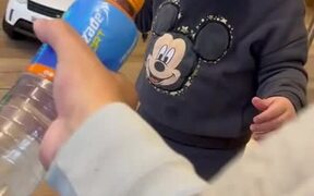 Toddler's Reaction To Getting Squirted By Water