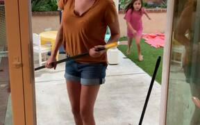 Clumsy Mom Almost Takes Daughter Out With a Broom