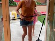 Clumsy Mom Almost Takes Daughter Out With a Broom