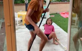 Clumsy Mom Almost Takes Daughter Out With a Broom - Fun - Videotime.com