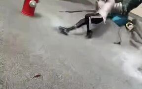 Guy Collides With Statue and Falls