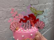 Cake Artist Decorates a Fascinating Cake