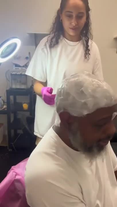 Dad Struggles While Girl Pulls Wax Off His Head