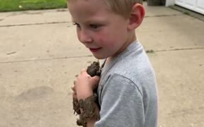 Kid Shows His Parent Army of Frogs