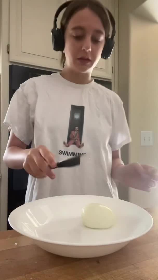 Microwaved Egg Explodes When Girl Cuts It