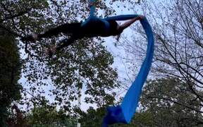 Woman Attempts Incredible Aerial Yoga Sequence - Sports - Videotime.com