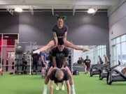 Trio Falls Down While Attempting Acrobatic Trick