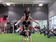 Trio Falls Down While Attempting Acrobatic Trick