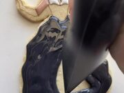 Person Decorates Wedding Themed Cookie