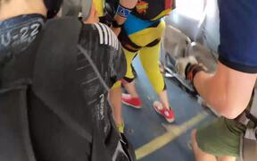 Group Skydives Out of Airplane and Performs Trick