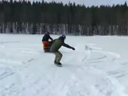 Skier Getting Dragged by Snowmobile