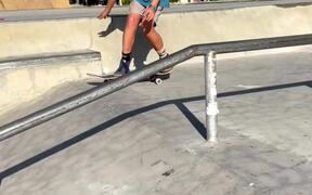 Skateboarder Lands on Butt While Attempting Trick