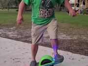 Man Falls While Trying to Ride 1Wheeled Skateboard